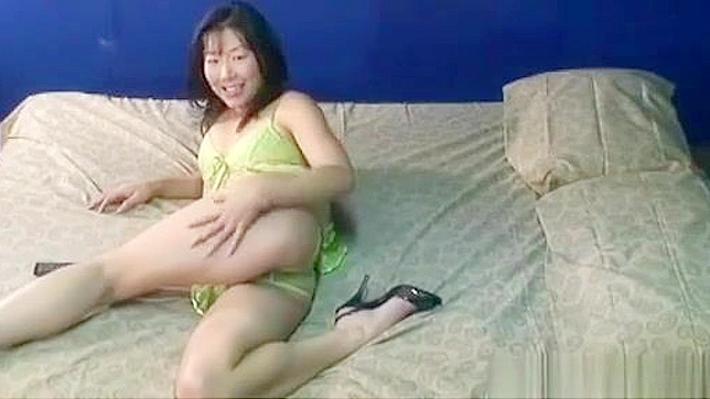 Introducing the Alluring Asian Enchantress and Her Luscious Shaved Pussy Solo Show