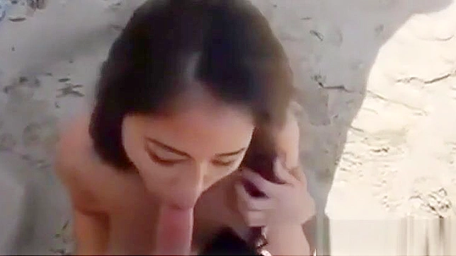 Stunning Chinese Babe Blows Big White Dick on the Beach