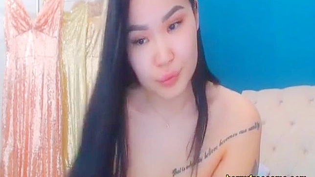 Catch a Glimpse of this Luscious Asian Enchantress Showing off her Curvy Figure Live!