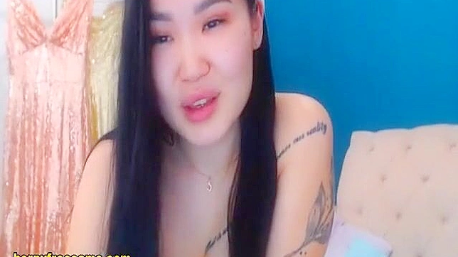 Catch a Glimpse of this Luscious Asian Enchantress Showing off her Curvy Figure Live!