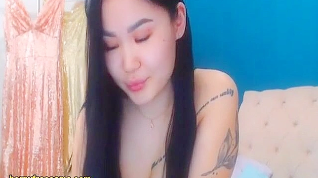 Catch a Glimpse of this Luscious Asian Enchantress Showing off her Curvy Figure Live!