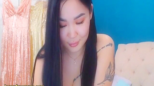 Catch a Glimpse of this Luscious Asian Enchantress Showing off her Curvy Figure Live!