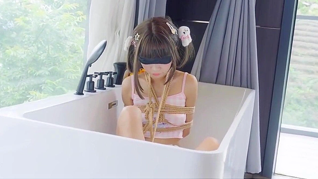 Soak in the Allure of an Enchanting Asian Beauty in this Steamy Bathtub Video!