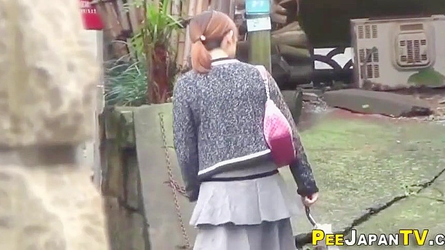 Japanese Beauty Exposes Herself in Public Urination - A Must-Watch!