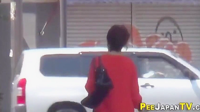 Wet and Wild ~ Asian Beauty Pees in a Car Park