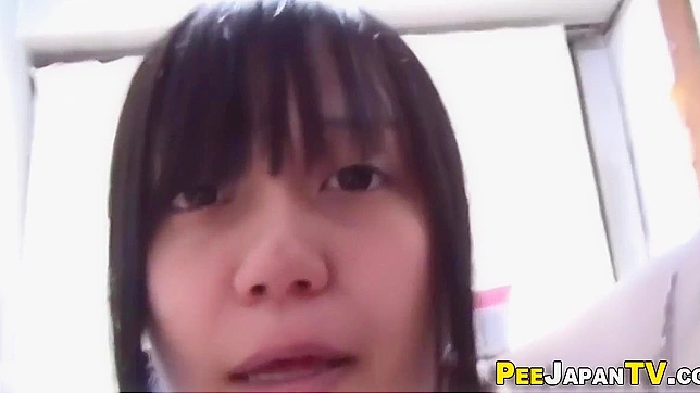 Japanese Teen Pee Play ~ Peeing in a Bottle the Cute Way