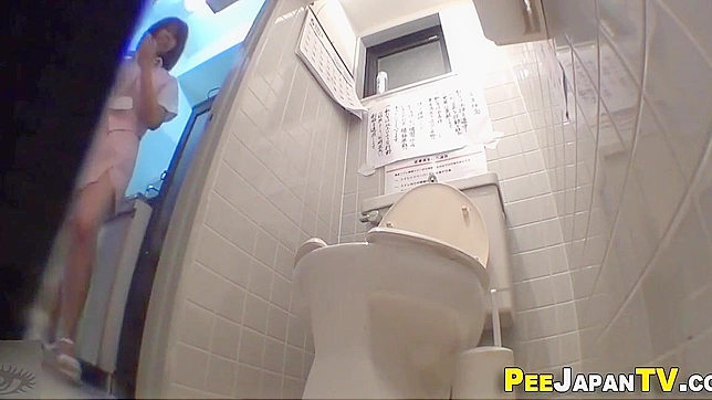 Japanese Beauty with Wet Panties - A Must-Watch Urinal Video