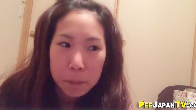 Japanese Porn ~ Peeing In Cup - A Must-Watch Fetish Video!