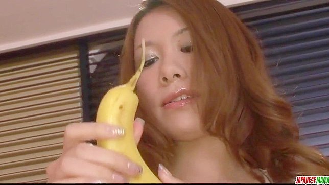 Japanese Porn ~ Redhead Goddess Teases With Banana