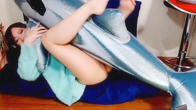 Japanese Babe Riding a Dolphin for Wild Pleasure - A Must-Watch!