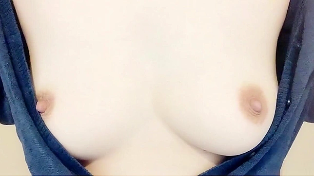 Japanese Beauty's Luscious Boobs Get a Sensual Massage - Watch Now!