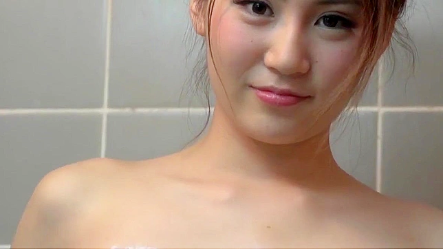 Akane's Sensual Bikini Wash - A Luscious Japanese Enchantress Teases and Tempts