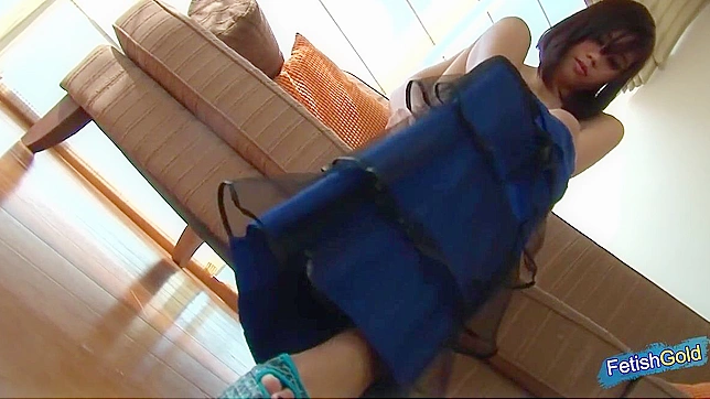 Sexy Japanese Babe Attempts Fitting into a Tight Blue Dress