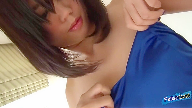 Sexy Japanese Babe Attempts Fitting into a Tight Blue Dress