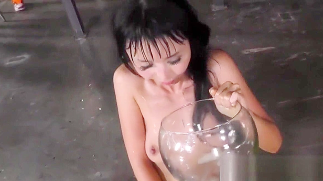 Japanese Slut Sucks Cocks and Gets Covered in Cum from a Massive Bukkake.