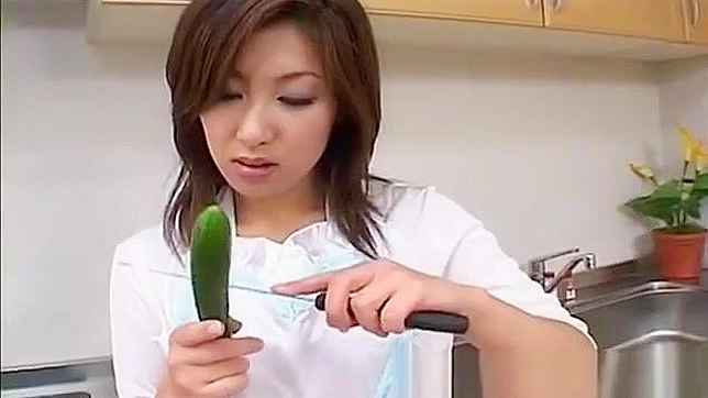 Saku Momoa, a Hot Asian MILF, Gets Naughty with Her Veggies in a Solo Scene.