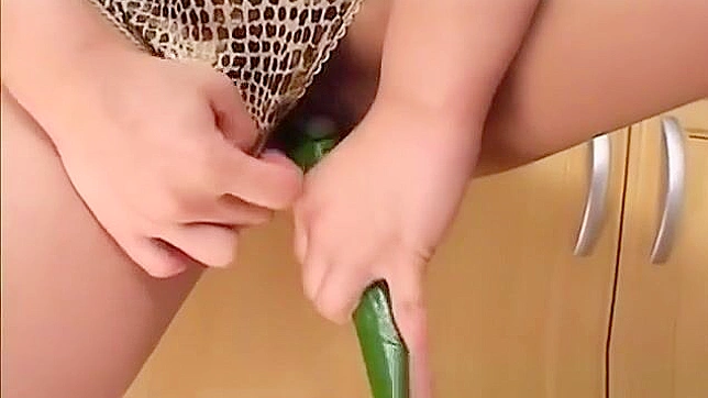 Saku Momoa, a Hot Asian MILF, Gets Naughty with Her Veggies in a Solo Scene.