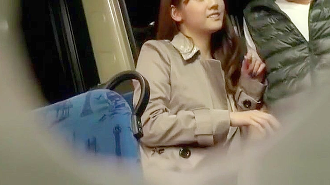 Busty Japanese Babe Gives a Public Handjob to a Lucky Passenger on the Bus.