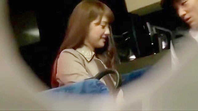 Busty Japanese Babe Gives a Public Handjob to a Lucky Passenger on the Bus.