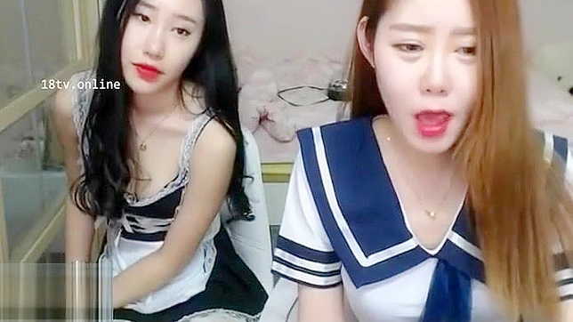 Korean Lesbians in Sexy Uniforms, Licking and Fingering Each Other Passionately.