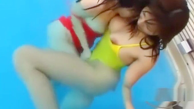 Two Asian Beauties in Swimsuits, Sucking Nipples and Rubbing Their Pussies Passionately.