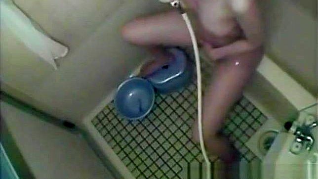 Nurse Masturbates in the Dorm Bathroom, Playing with Her Wet Pussy.