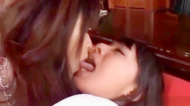 Asian Lesbians with Shaved Pussies Rubbing and Kissing Each Other Passionately.