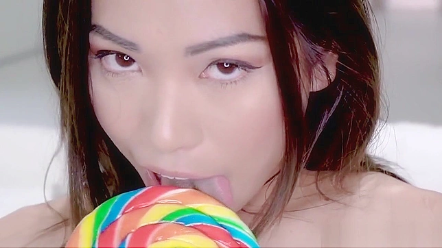 Gorgeous Asian Babe Sucks Lollipop, Fucks Lucky Guy, and Plays with Cum.