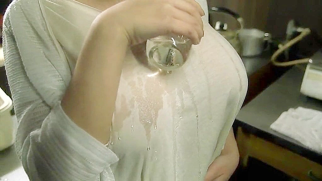 Big-Breasted Japanese Milf Treats Man to Mind-Blowing Titjob