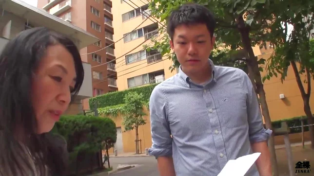 Elderly Japanese Lady Gets Soaked and Pleasured by Young 18+ Man in Steamy Shower