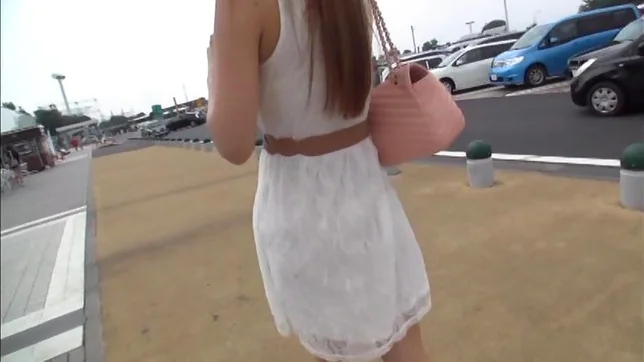 Long-haired Asian redhead Kokomi Sakura seduces a guy in a car 3