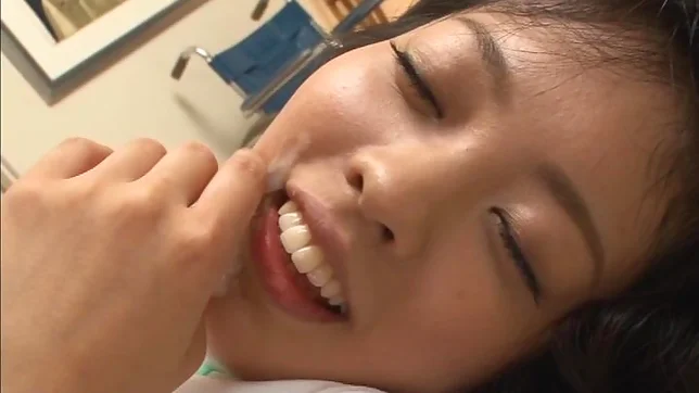 Beautiful Arisa Fujii in raunchy handjob scene indoors 4