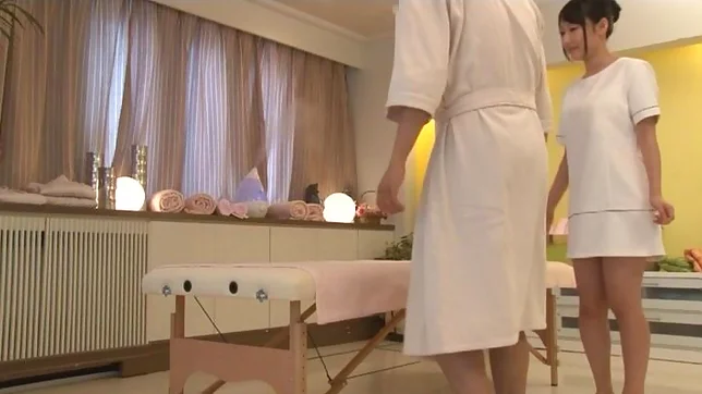 Delicious Japanese masseuse rides dick and gets cum on tits