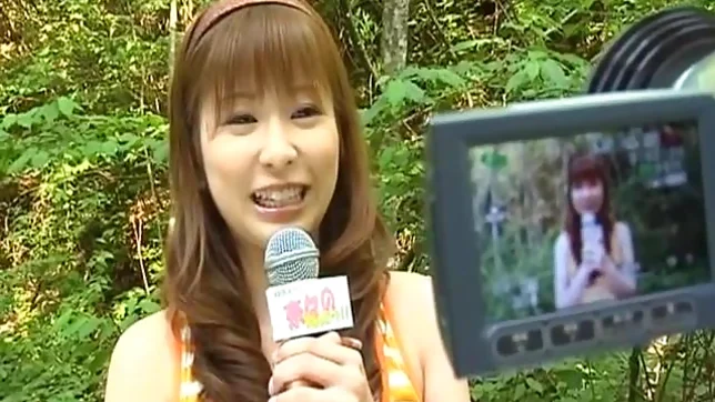 Nana Ootone Lovely Asian reporter is nude in the woods
