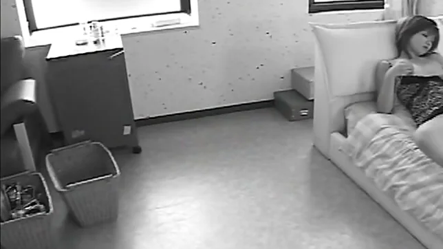 Pretty Japanese model fondles her wet pussy