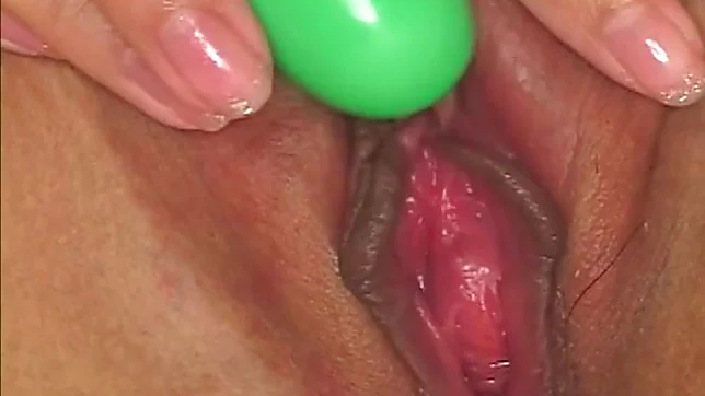 Japanese AV model fondles her pussy