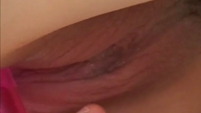 Japanese AV model fondles her juicy pussy