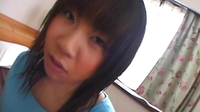 Asian model has a sexy huge set of boobs