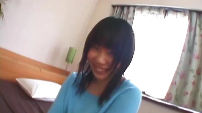 Asian model has a sexy huge set of boobs