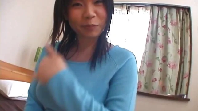 Asian model has a sexy huge set of boobs