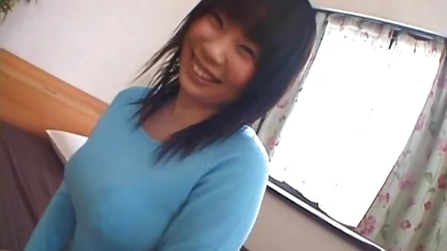 Asian model has a sexy huge set of boobs