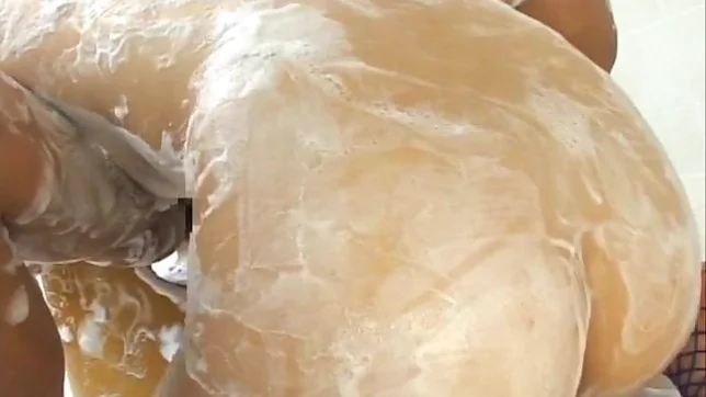 Moka Asian model plays with cock in the shower