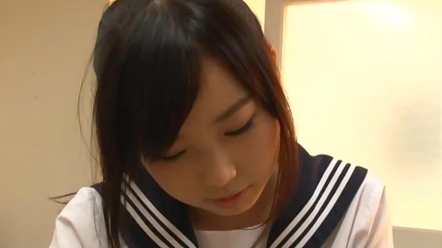 Japanese schoolgirl, Aimi Usui, receives a harsh fuck