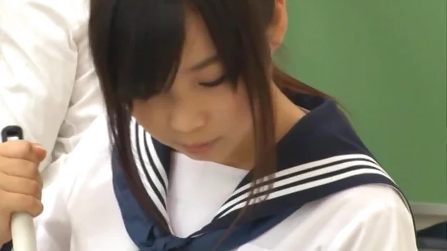 Japanese schoolgirl, Aimi Usui, receives a harsh fuck