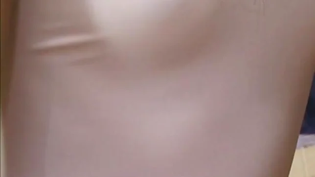 Japanese AV model is a horny babe giving head