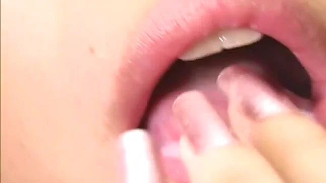 Japanese AV model is a horny babe giving head 2