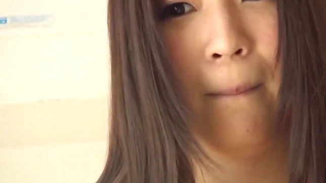 Chitose Saegusa gets on her knees and blows a cock 3