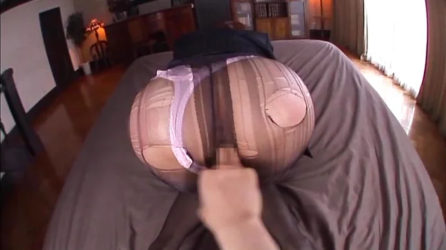 Kinky office lady in pantyhose Tsubasa Amami gives a foot job 5