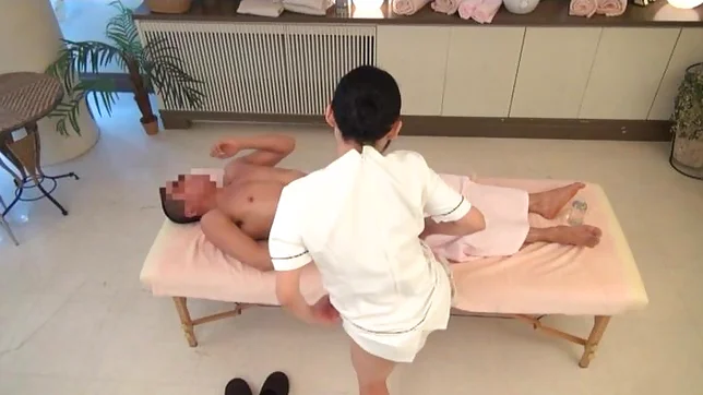 Delicious Japanese masseuse rides dick and gets cum on tits 3