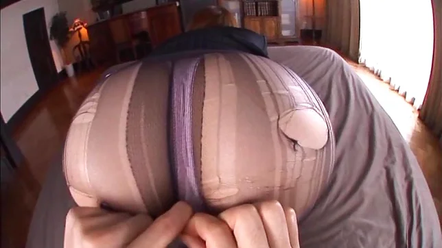 Kinky office lady in pantyhose Tsubasa Amami gives a foot job 6